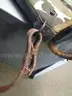 (1) USED MACHETE IN BLACK SHEATH; (1) USED SOG KNIFE IN BLACK SHEATH; (1) USED LEATHER HOLSTER; (1) USED CAMO HOLSTER