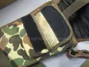 (1) USED MACHETE IN BLACK SHEATH; (1) USED SOG KNIFE IN BLACK SHEATH; (1) USED LEATHER HOLSTER; (1) USED CAMO HOLSTER