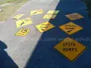USED (4) SPEED HUMP SIGNS, (2) TRAIL X-ING SIGNS, (2) BIKE AND PEDESTRIAN SIGNS, (1) ARROW SIGN, (1) 15 MPH SIGN
