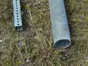 USED (2) ALUMINIUM ROUND POLES, (6) METAL TRAFFIC POLES, (1) SQUARE SIGN POST, (1) ALUMINIUM CURVED POLE