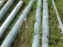 USED (2) ALUMINIUM ROUND POLES, (6) METAL TRAFFIC POLES, (1) SQUARE SIGN POST, (1) ALUMINIUM CURVED POLE