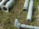 USED (2) ALUMINIUM ROUND POLES, (6) METAL TRAFFIC POLES, (1) SQUARE SIGN POST, (1) ALUMINIUM CURVED POLE