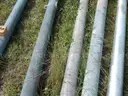 USED (2) ALUMINIUM ROUND POLES, (6) METAL TRAFFIC POLES, (1) SQUARE SIGN POST, (1) ALUMINIUM CURVED POLE