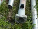 USED (2) ALUMINIUM ROUND POLES, (6) METAL TRAFFIC POLES, (1) SQUARE SIGN POST, (1) ALUMINIUM CURVED POLE