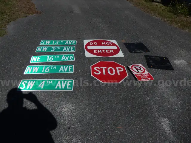 USED (5) STREET SIGNS, (2) BLACK SIGNS, (1) DO NOT ENTER SIGN, (1) STOP SIGN, (1) TOW AWAY ZONE SIGN