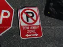 USED (5) STREET SIGNS, (2) BLACK SIGNS, (1) DO NOT ENTER SIGN, (1) STOP SIGN, (1) TOW AWAY ZONE SIGN