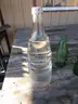 (115) RECOVERED GLASS BOTTLES AND JARS