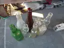 (115) RECOVERED GLASS BOTTLES AND JARS
