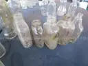 (115) RECOVERED GLASS BOTTLES AND JARS