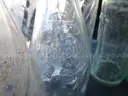 (115) RECOVERED GLASS BOTTLES AND JARS