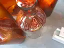 (115) RECOVERED GLASS BOTTLES AND JARS