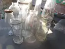 (115) RECOVERED GLASS BOTTLES AND JARS