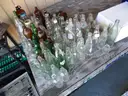 (115) RECOVERED GLASS BOTTLES AND JARS