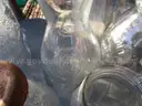 (115) RECOVERED GLASS BOTTLES AND JARS