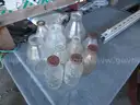(115) RECOVERED GLASS BOTTLES AND JARS