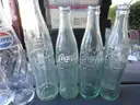 (115) RECOVERED GLASS BOTTLES AND JARS