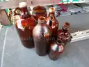 (115) RECOVERED GLASS BOTTLES AND JARS