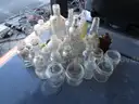 (115) RECOVERED GLASS BOTTLES AND JARS