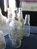 (115) RECOVERED GLASS BOTTLES AND JARS