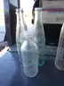 (115) RECOVERED GLASS BOTTLES AND JARS
