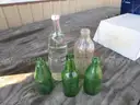(115) RECOVERED GLASS BOTTLES AND JARS