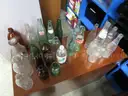 (27) RECOVERED GLASS BOTTLES, VARIOUS SIZES AND DESIGNS