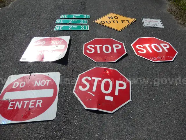 USED (3) STREET SIGNS, (3) STOP SIGNS, (2) DO NOT ENTER SIGNS, (1) NO OUTLET SIGN, (1) NO TRASPASSING SIGN