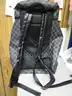 (1) LIKE-NEW BLACK AND GRAY CHECKERED BACKPACK