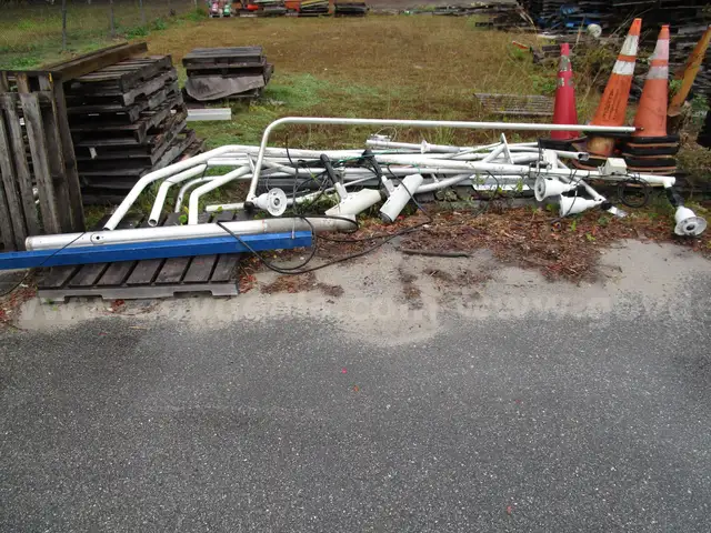 (15) USED ALUMINUM POLES; (7) HAVE CAMERAS