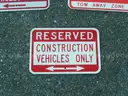 USED (4) RESERVED CONSTRUCTION VEHICLES ONLY SIGNS, (1) DO NOT BLOCK SIGN, (2) NO PARKING VALET PARKING SIGNS
