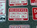 USED (4) RESERVED CONSTRUCTION VEHICLES ONLY SIGNS, (1) DO NOT BLOCK SIGN, (2) NO PARKING VALET PARKING SIGNS