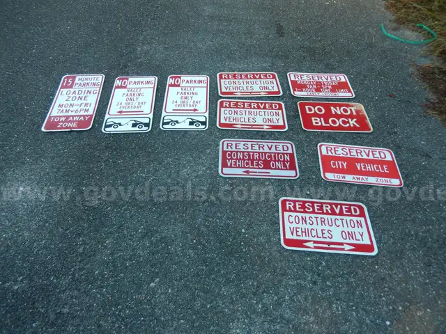 USED (4) RESERVED CONSTRUCTION VEHICLES ONLY SIGNS, (1) DO NOT BLOCK SIGN, (2) NO PARKING VALET PARKING SIGNS