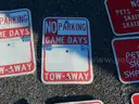 USED (6) NO PARKING GAME DAYS SIGNS, (4) PETS- BIKE, SKATES, AND SKATEBOARD PROHIBITED SIGNS