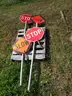 (4) USED TRAFFIC STOP/SLOW SIGNS