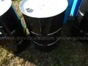USED (3) 55 GALLON BLACK METAL DRUMS, (1) 55 GALLON BLUE METAL DRUM, (3) 30 GALLONBLUE PLASTIC DRUMS