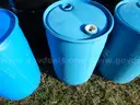 USED (3) 55 GALLON BLACK METAL DRUMS, (1) 55 GALLON BLUE METAL DRUM, (3) 30 GALLONBLUE PLASTIC DRUMS