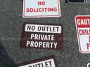 USED (2) STOP SIGNS, (1) NO SOLICITING SIGN, (1) STREET SIGN, (1) AHEAD SIGN, (2) NO OUTLET PRIVATE PROPERTY SIGNS