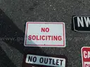 USED (2) STOP SIGNS, (1) NO SOLICITING SIGN, (1) STREET SIGN, (1) AHEAD SIGN, (2) NO OUTLET PRIVATE PROPERTY SIGNS