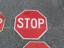 USED (5) STOP SIGNS, (2) STREET SIGNS, (1) TRAIL X-ING, (1) NO MOTOR VEHICLES, (1) ARROW SIGN