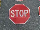 USED (5) STOP SIGNS, (2) STREET SIGNS, (1) TRAIL X-ING, (1) NO MOTOR VEHICLES, (1) ARROW SIGN