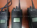 USED (11) MOTOROLA MTS2000 FLASH PORT WALKIE TALKIE, (3) IMPRES ADAPTIVE MOTOROLA CHARGERS, (4) WALKIE TALKIE BATTERIES