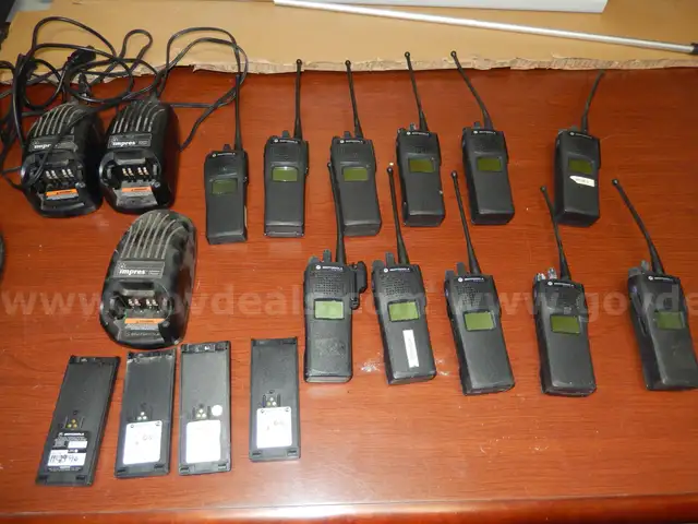 USED (11) MOTOROLA MTS2000 FLASH PORT WALKIE TALKIE, (3) IMPRES ADAPTIVE MOTOROLA CHARGERS, (4) WALKIE TALKIE BATTERIES