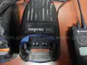 USED (11) MOTOROLA MTS2000 FLASH PORT WALKIE TALKIE, (3) IMPRES ADAPTIVE MOTOROLA CHARGERS, (4) WALKIE TALKIE BATTERIES