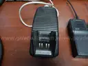 USED (1) MOTOROLA BATTERY CHARGER, (1) MOTOROLA HT750 WALKIE TALKIE, (11) MOTOROLA MTS2000 FLASH PORT WALKIE TALKIE