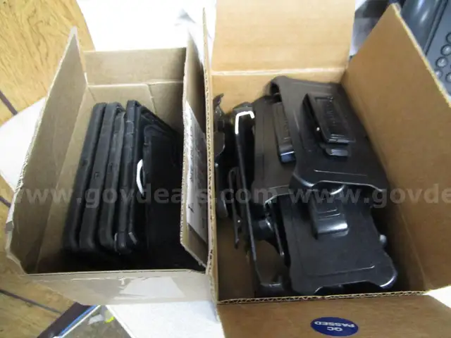 (7) USED PHONE CASES; (11) USED OTTERBOX PHONE HOLDERS
