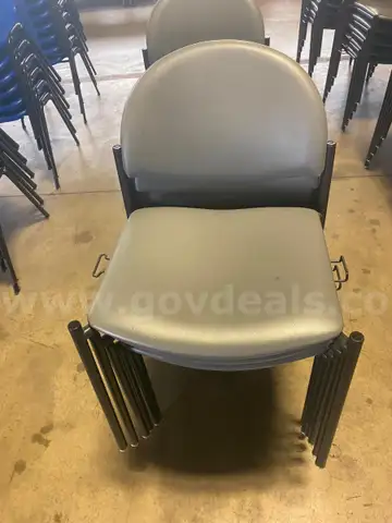 LOT OF 44 GRAY VINYL STACKING CHAIRS