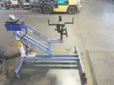 WHITE AND BLUE HYDRAULIC LIFT