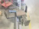 WHITE AND BLUE HYDRAULIC LIFT