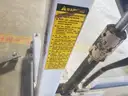 WHITE AND BLUE HYDRAULIC LIFT