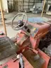 Ditch Witch ditching machine with backhoe and chain trencher